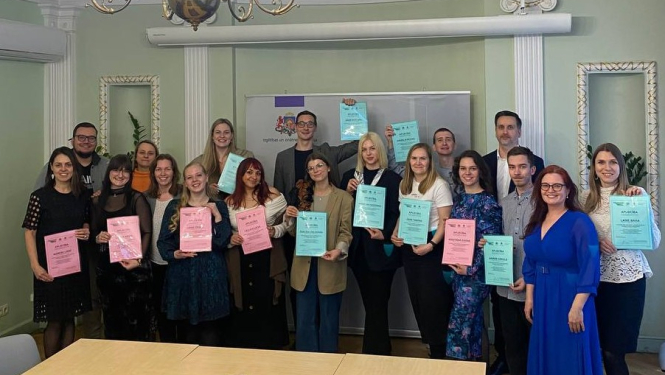 Kopbilde ar pasākuma dalībniekiem