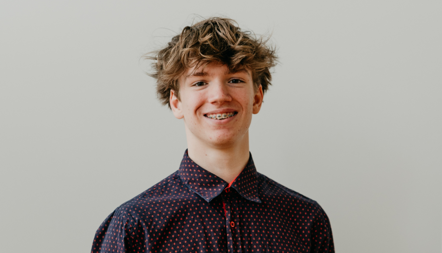 Gustavs, Raiņa skolas 9. klases skolēns